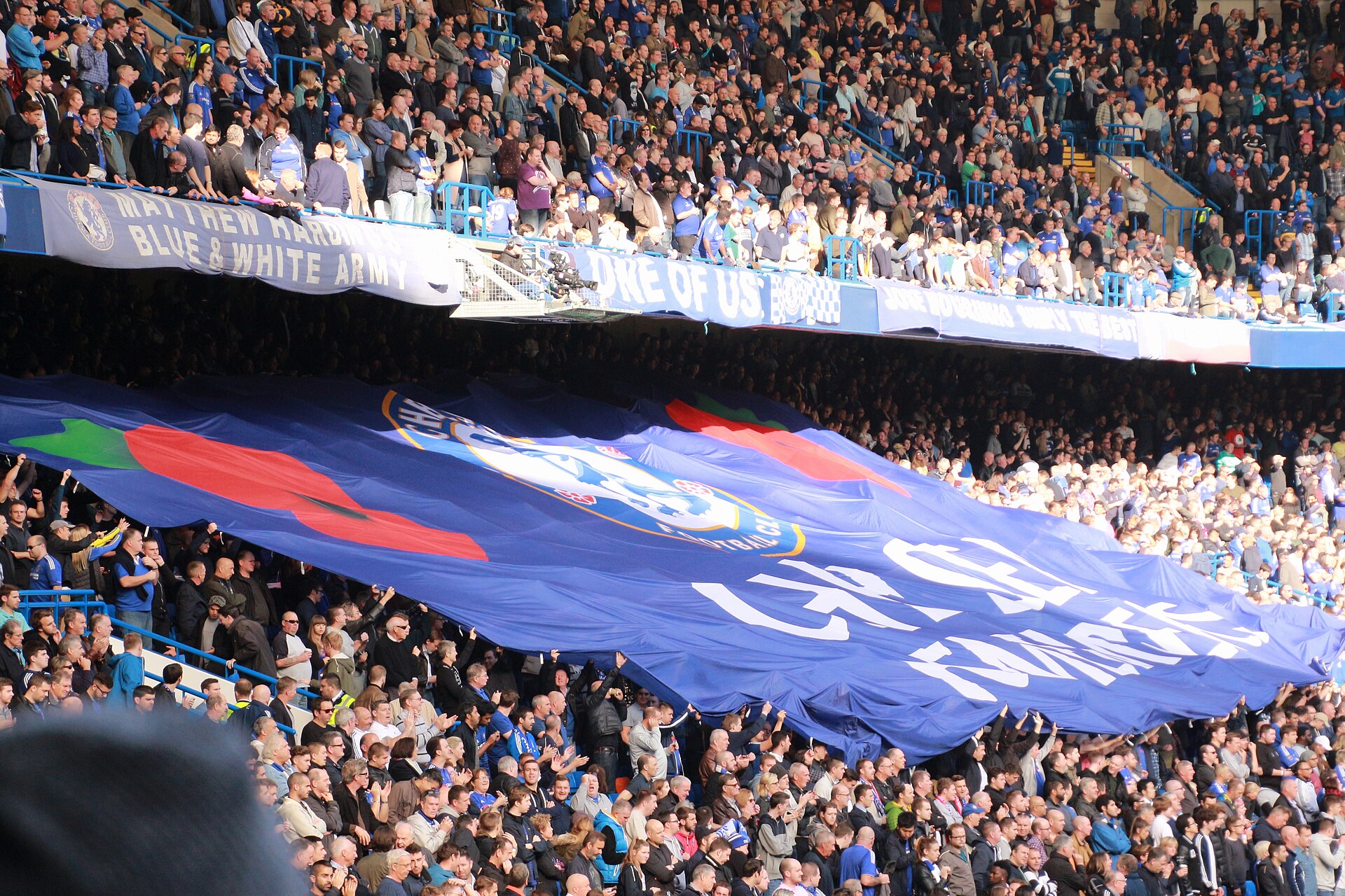 Chelsea supporters.jpg · @cfcunofficial (Chelsea Debs) London · CC BY-SA 2.0