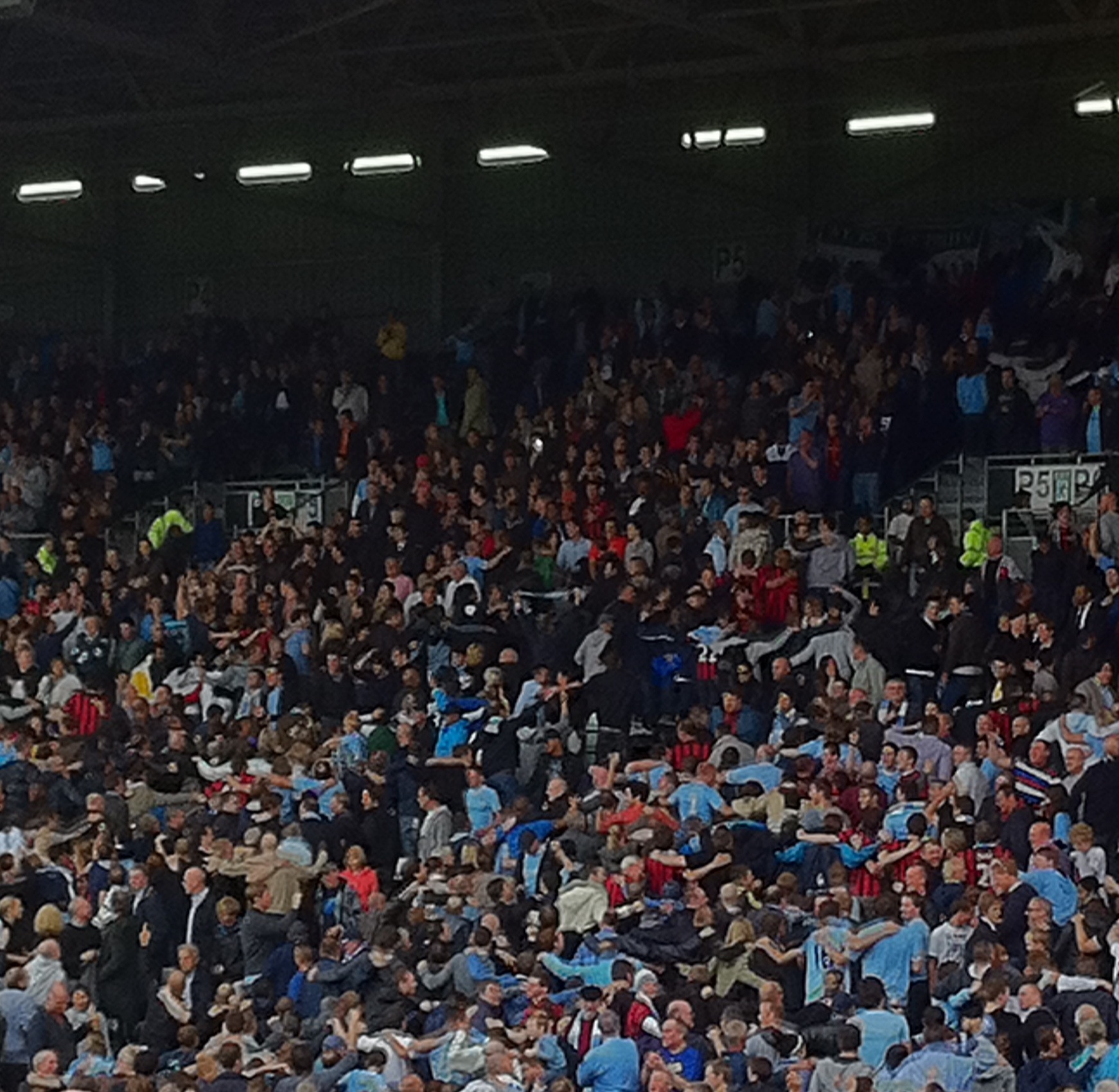 Man City Fans Doing Poznan.jpg · David Wilson · CC BY 2.0